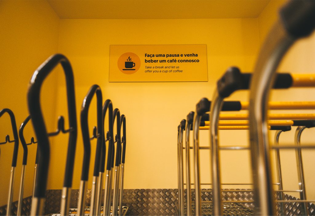 dollys and a signage suggesting a coffee break at kuboo loading bay