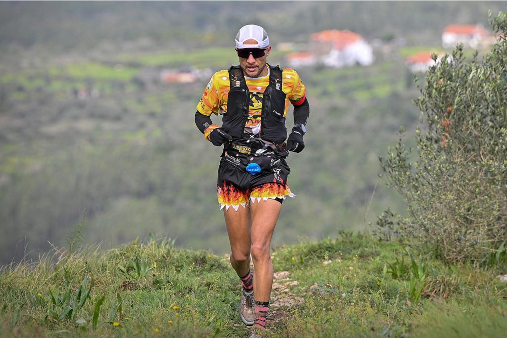 athlete running an ultra trail wearing kuboo logo